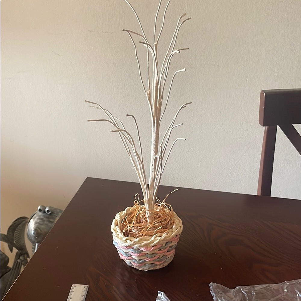 Easter Woven Basket with Decorative White Bendable Branches. Approx. 15” tall.